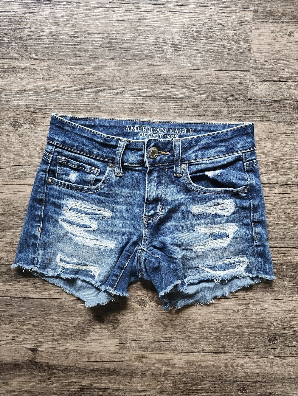 American Eagle Outfitters Super Stretch Midi Distressed Blue Denim Shorts